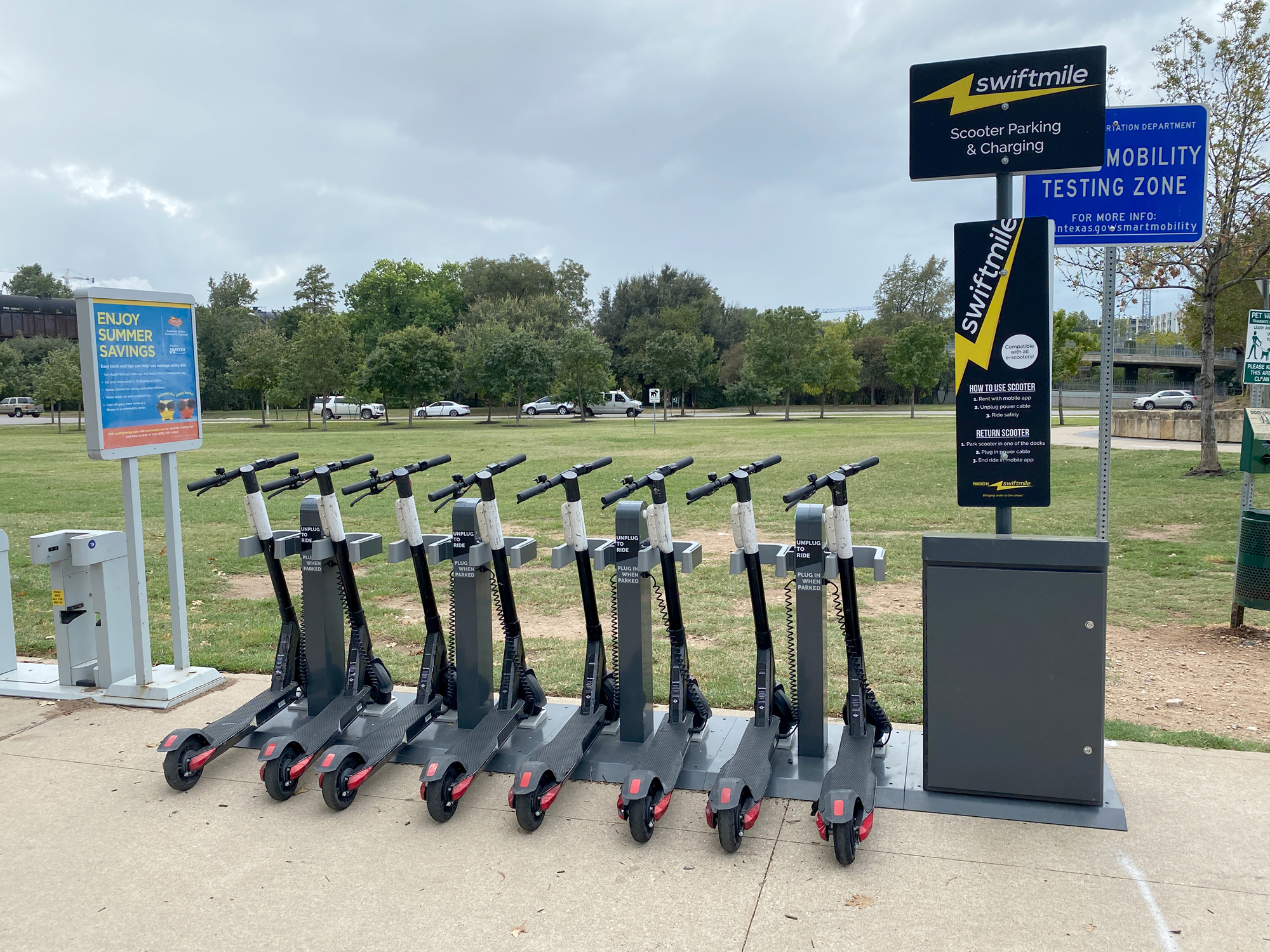 Swiftmile charging station with electric scooters